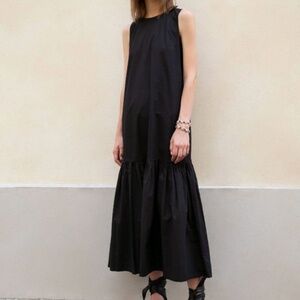The Frankie Shop LouLou Sleeveless Flouncy Hem Maxi Dress in Black